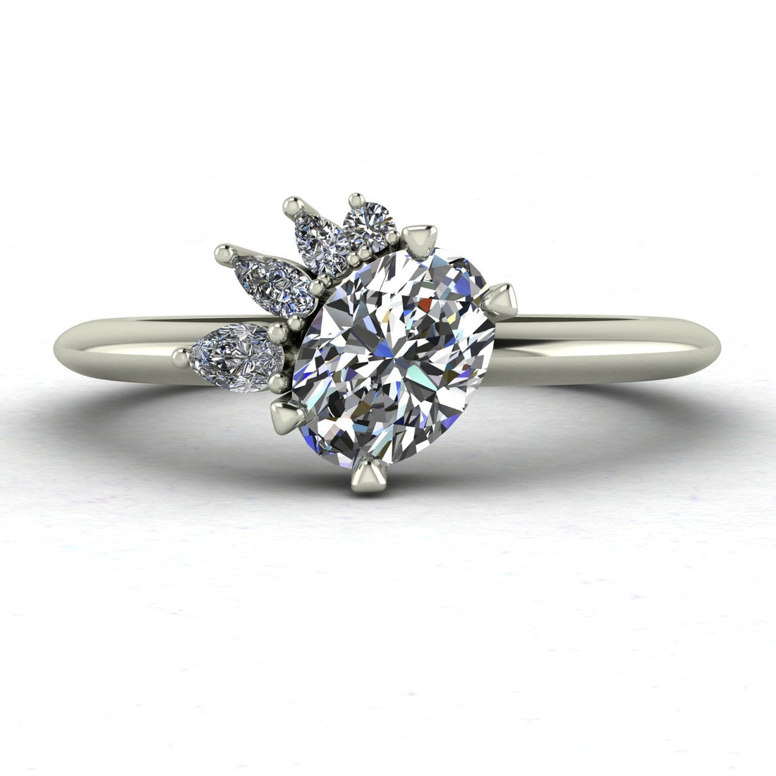The Selene asymmetrical oval diamond cluster engagement ring on a white background