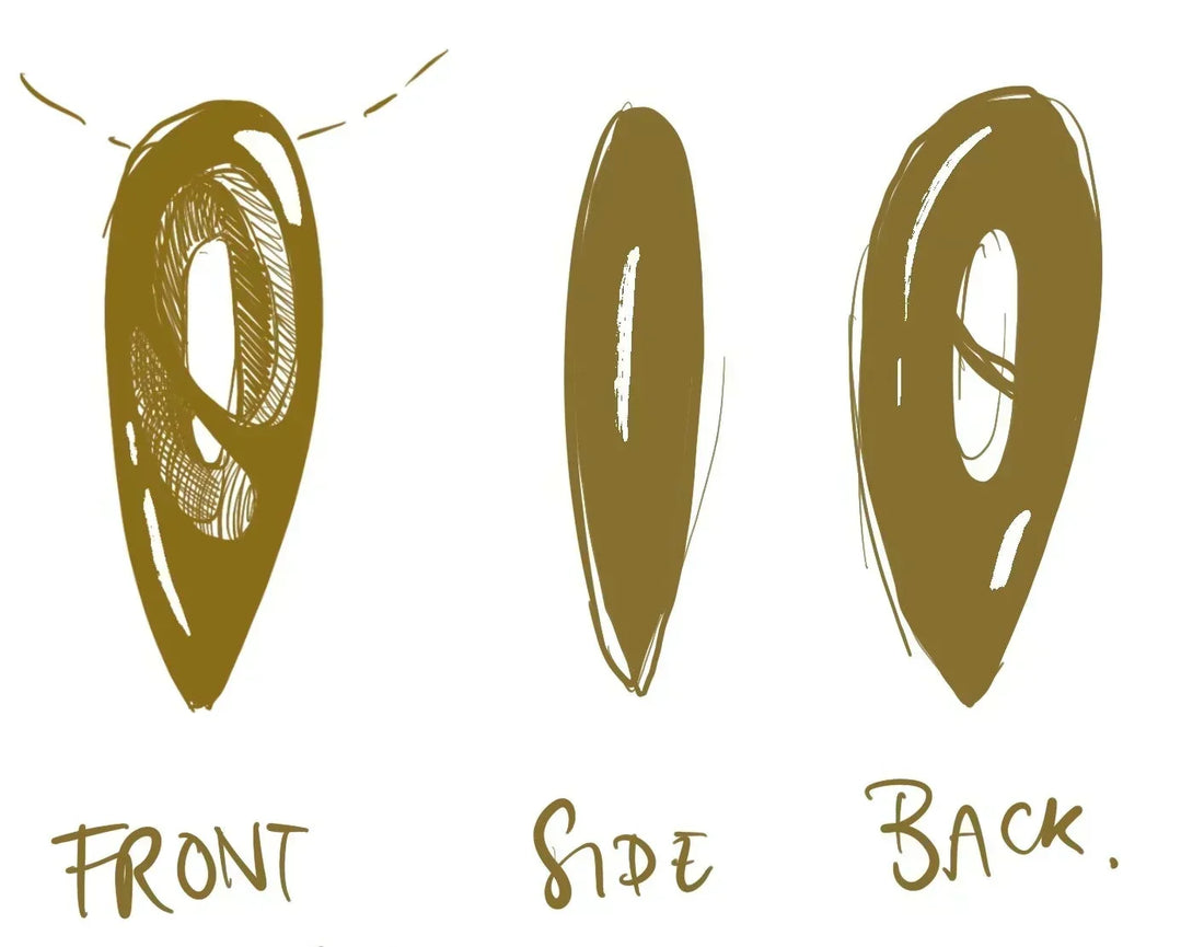 Sculptural gold ring shown from front, side and back views, handmade at Nude Jewellery's London studio