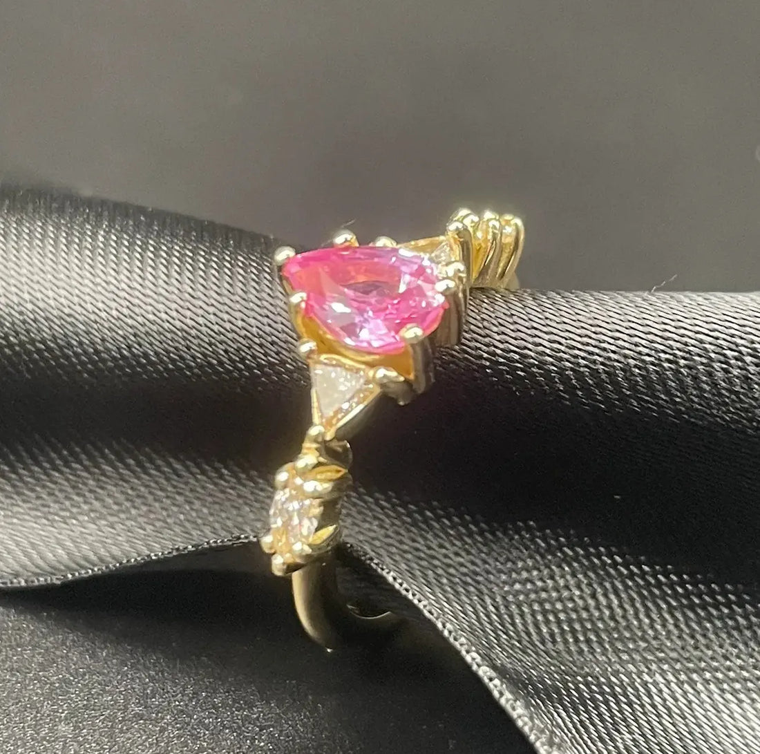 Bespoke pink sapphire engagement ring design consultation at Nude Jewellery's London studio