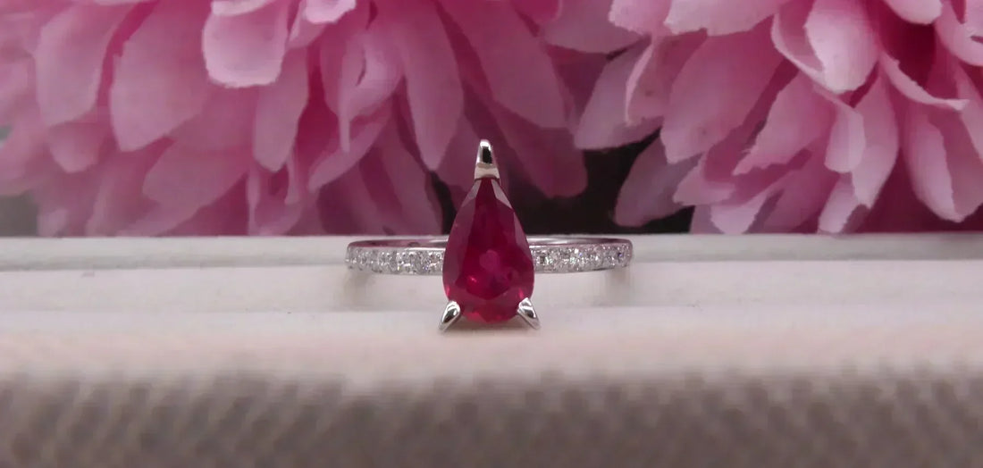 Calista pear-shaped ruby and black diamond engagement ring in platinum, handmade in our London studio