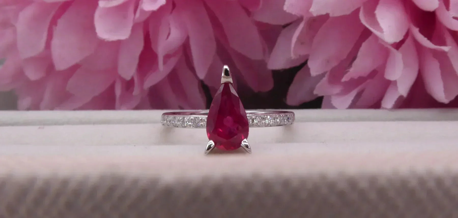 Calista pear-shaped ruby and black diamond engagement ring in platinum, handmade in our London studio