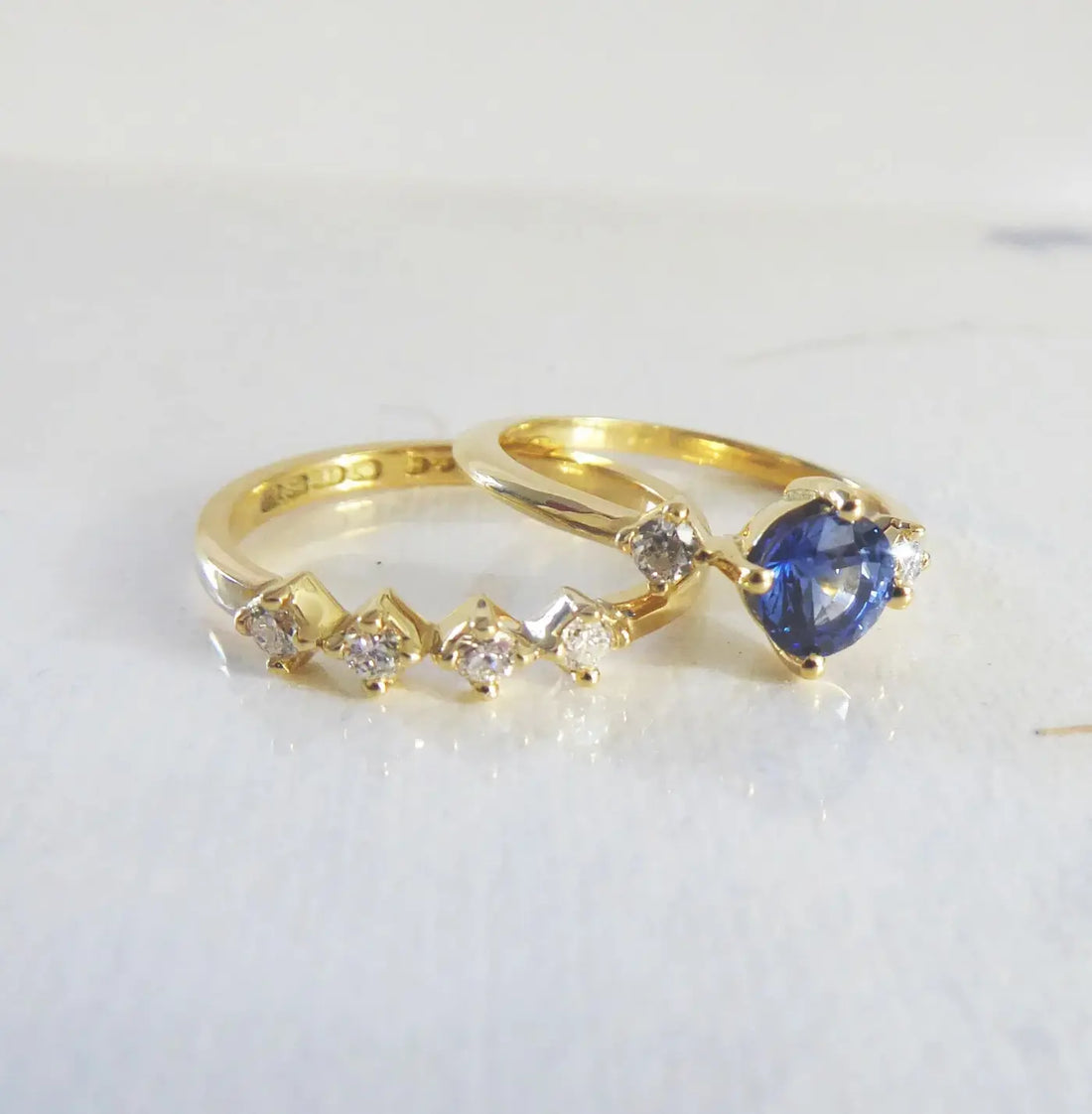 Carolyn's bespoke sapphire and diamond engagement and wedding ring set in 18ct yellow gold, handmade in our London studio
