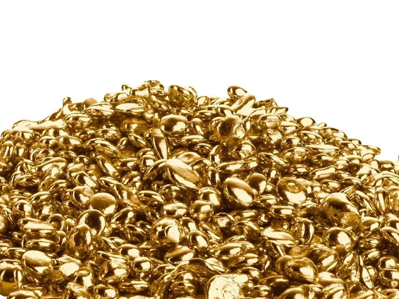 Close-up of gold casting grain used in fine jewellery making at Nude Jewellery's London studio