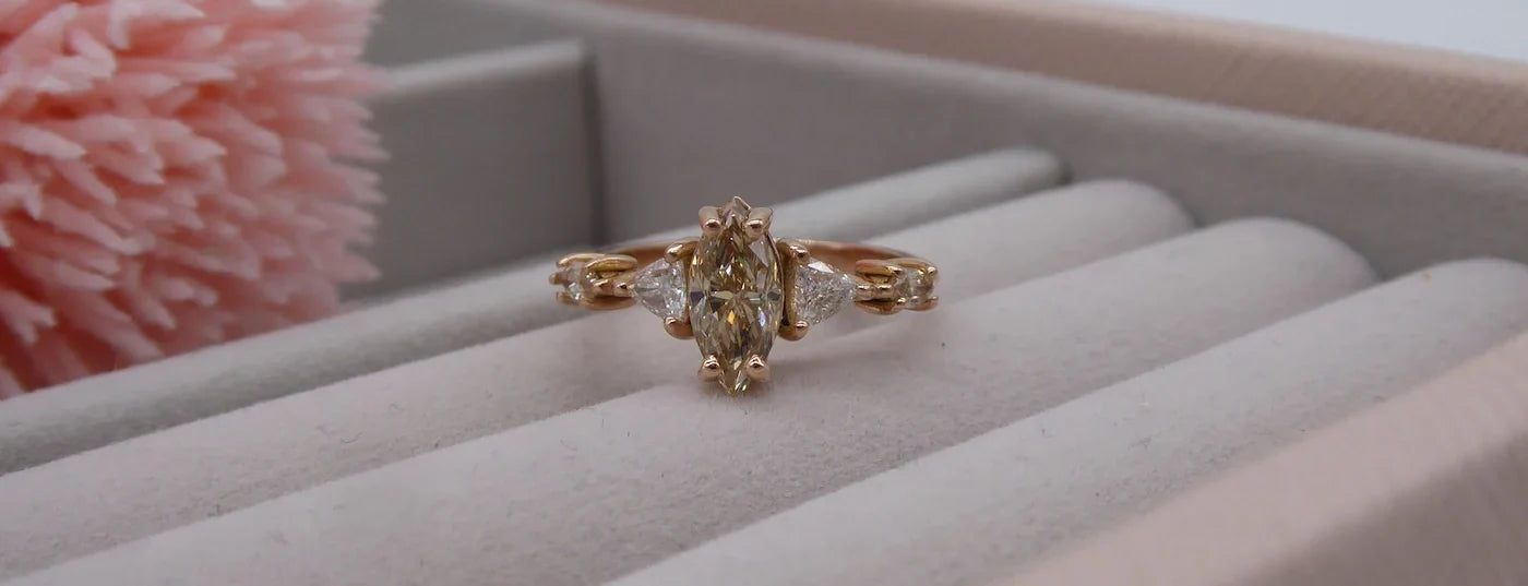 Maisie champagne diamond engagement ring in 18ct rose gold, showing the warm honey-toned stone against the blush metal