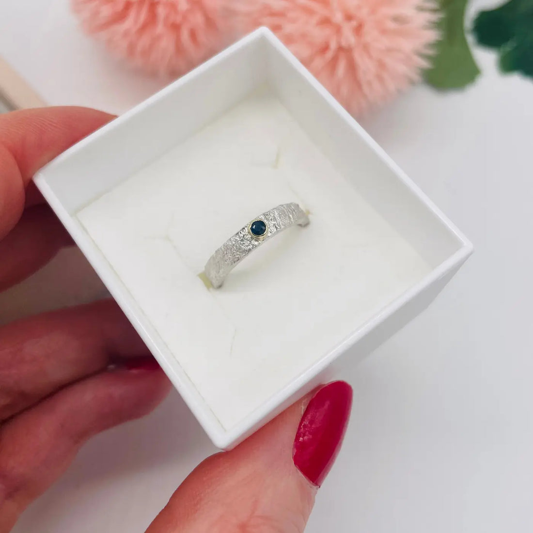 Rivda blue sapphire organic textured silver ring presented in Nude Jewellery gift box, handmade in our London studio