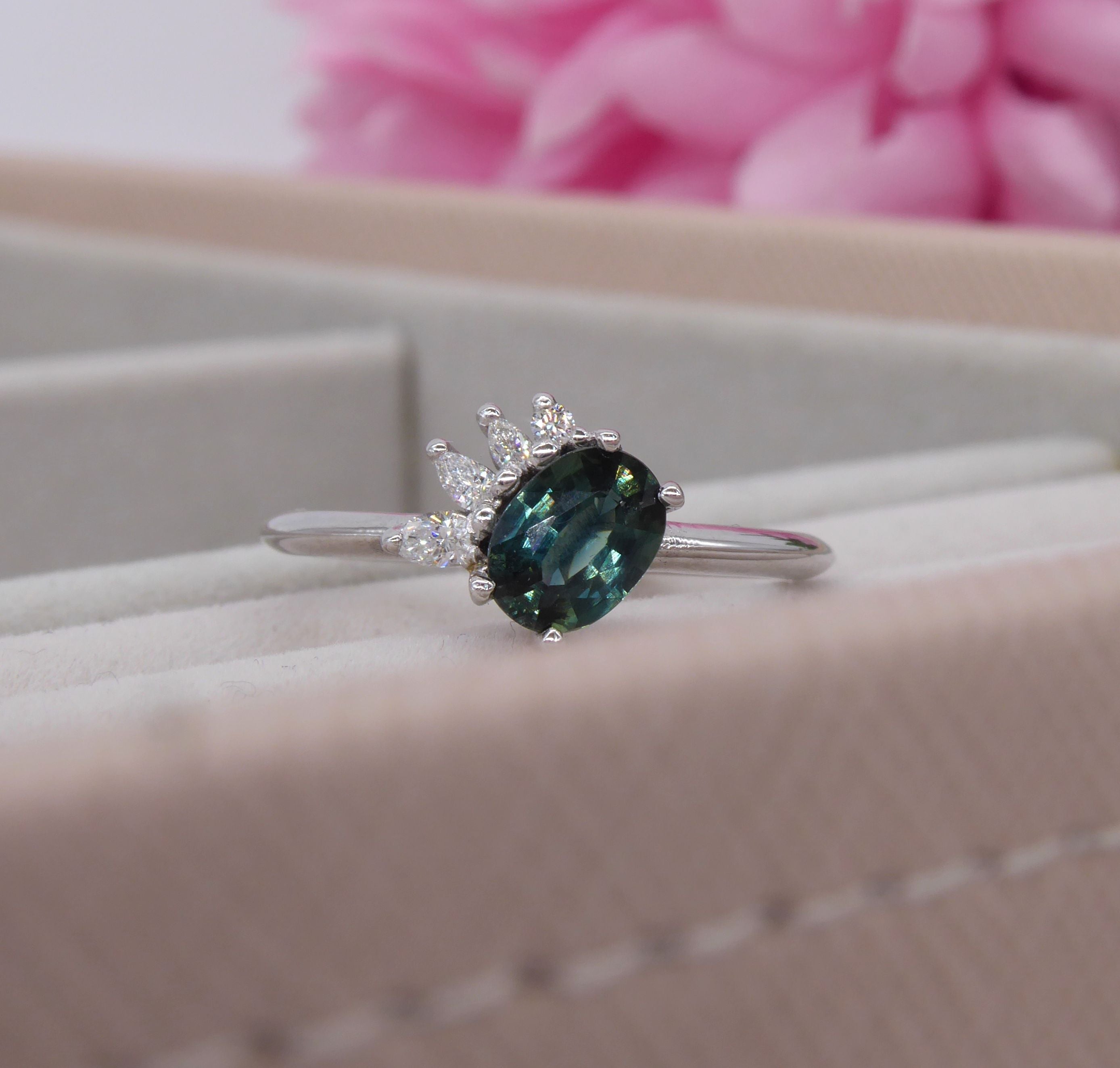 Selene Collection — asymmetric engagement ring with oval diamond and marquise wing detail, handmade in London