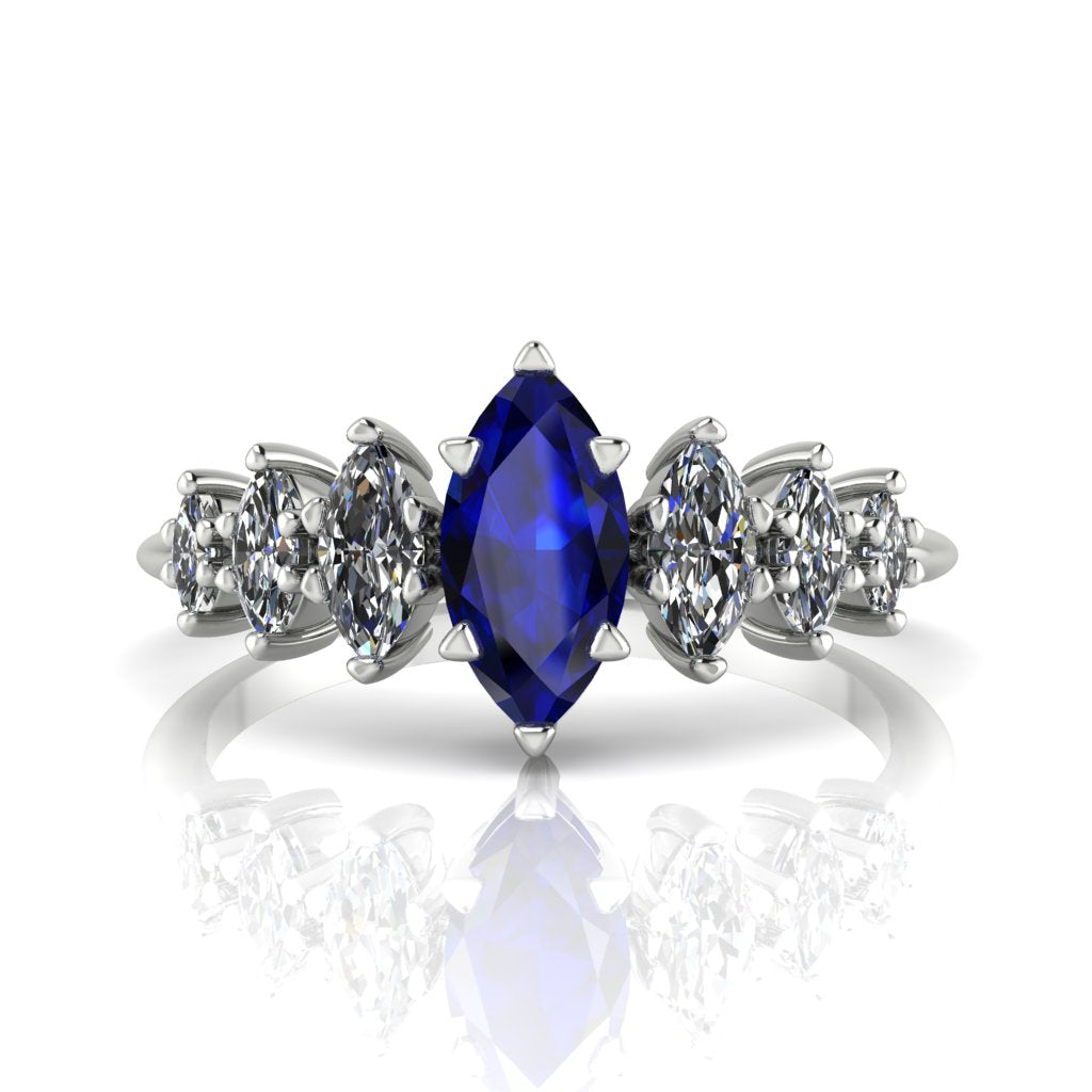 Harlequin Collection — seven graduating marquise gemstones in a geometric row ring, handmade in London