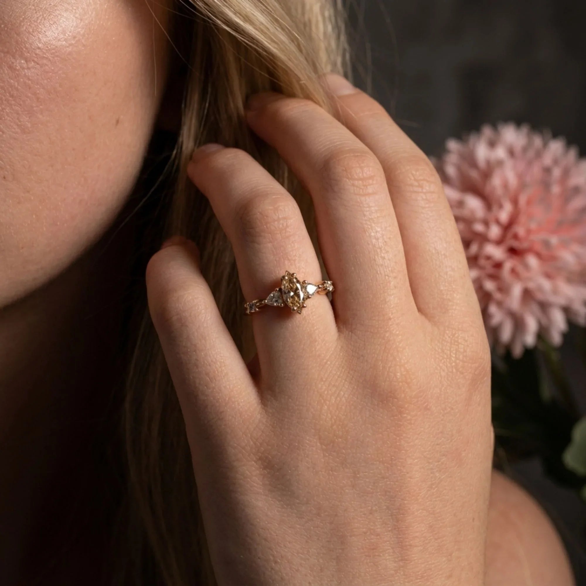 A model wearing the bestselling Maisie marquise engagement ring