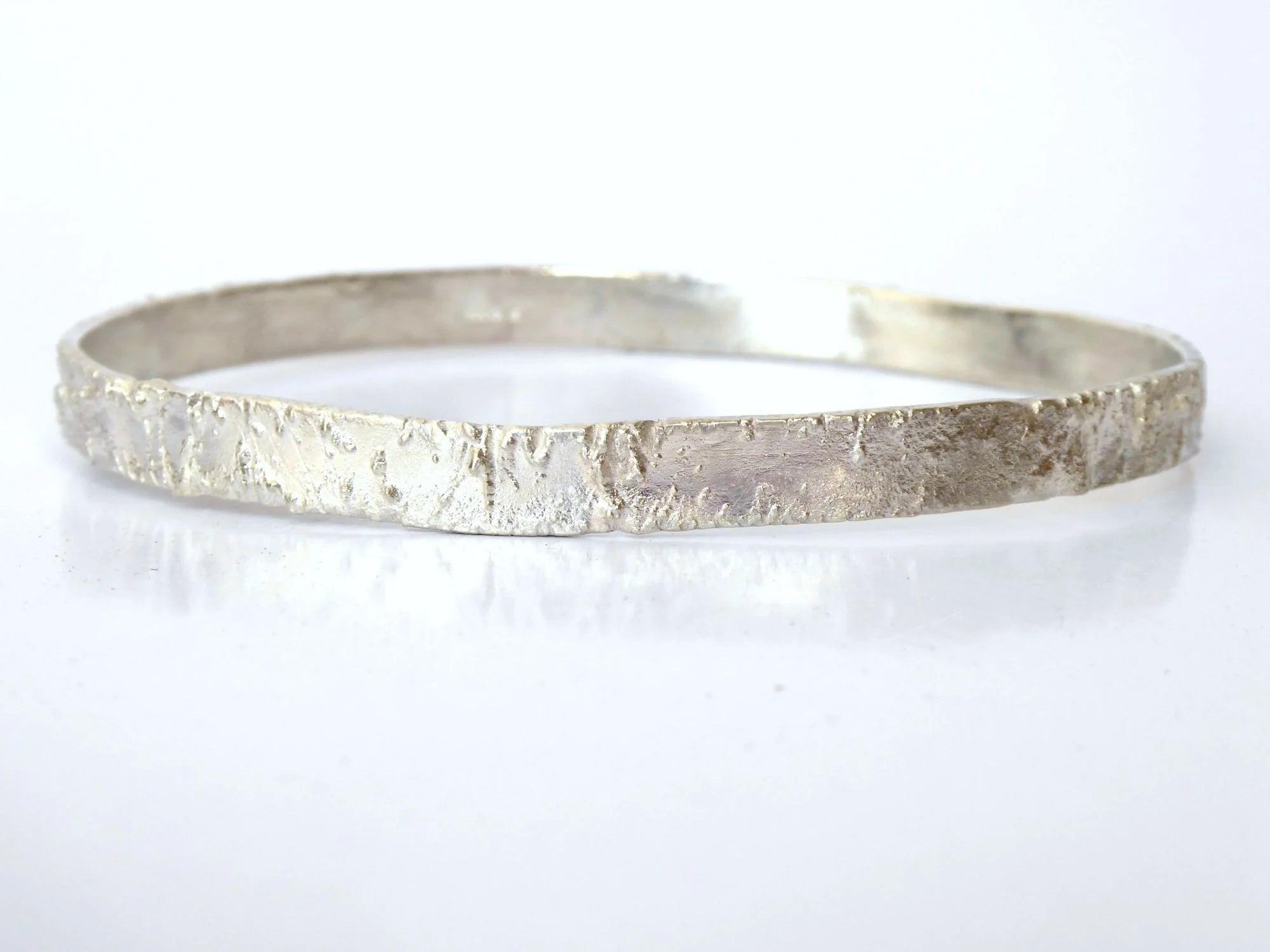 Rivda: 'Frozen Sand' Organic Textured Bangle | Handmade Silver