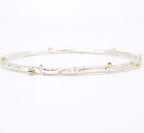 Rivda: Organic Textured Bangle | Silver & 9ct Gold Detail