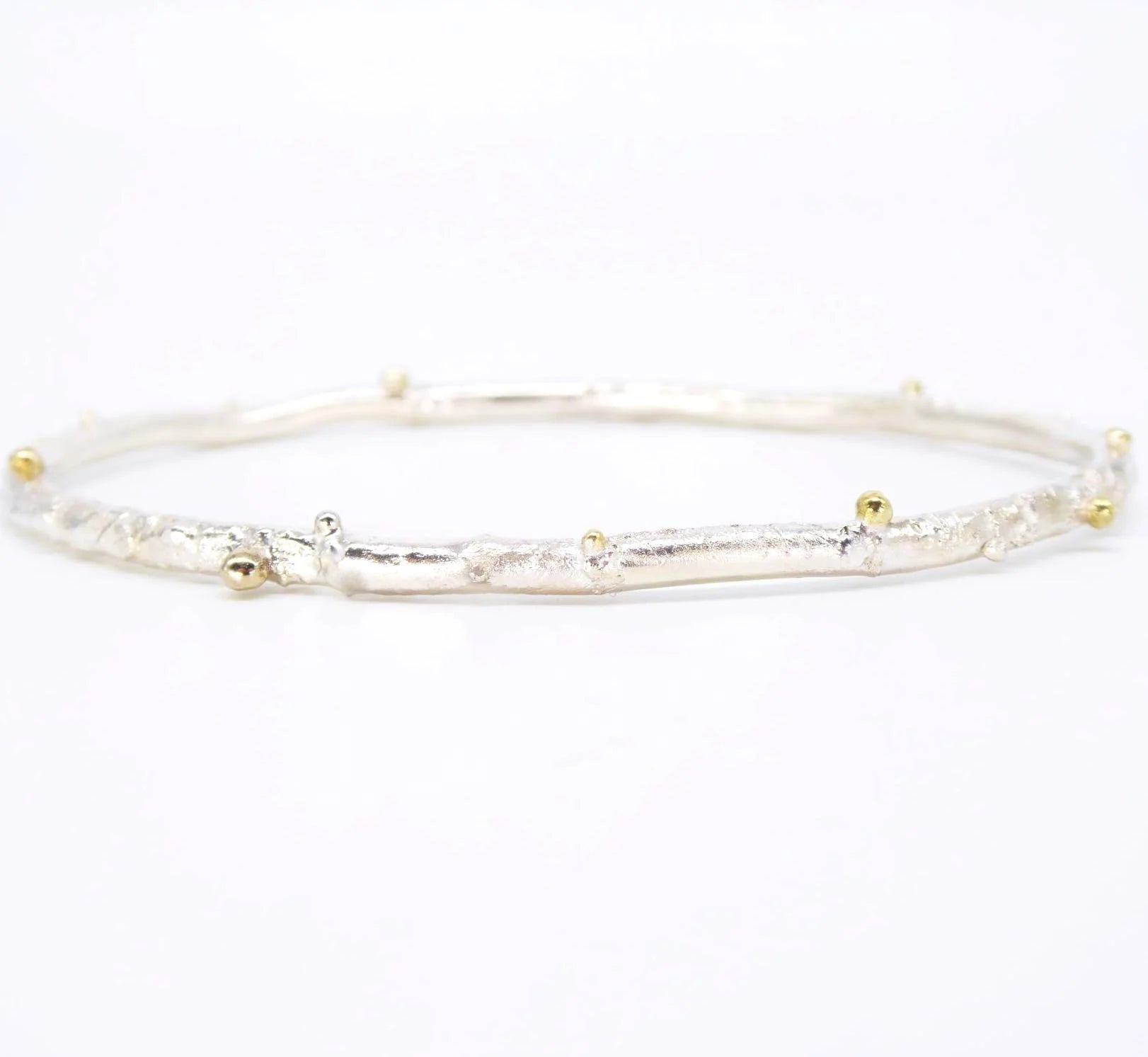 Rivda: Organic Textured Bangle | Silver & 9ct Gold Detail