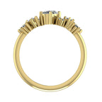 A view through the centre of the 18ct yellow gold band, highlighting the profile and gemstone setting height.