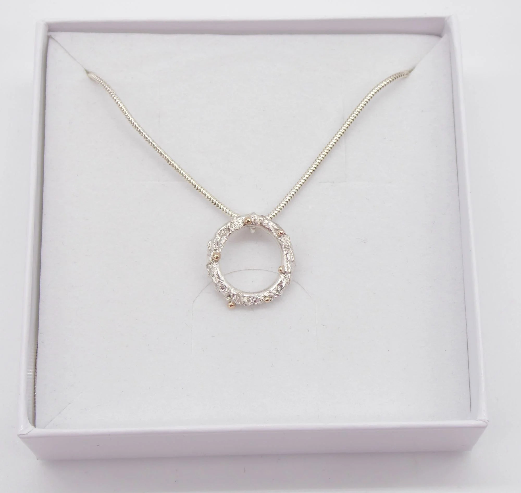 Rivda: Organic Textured Loop Pendant | Silver & 9ct Gold Detail