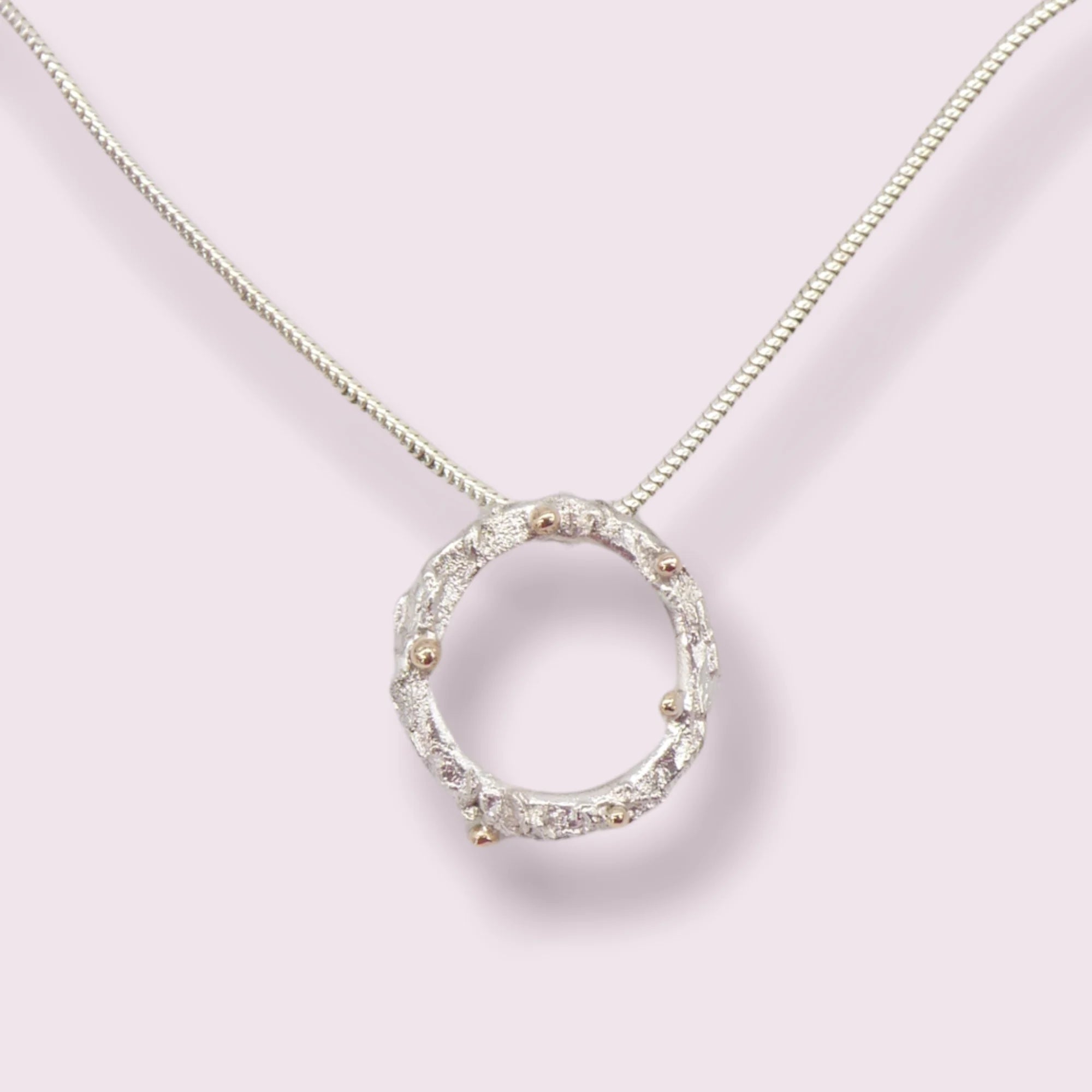 Rivda: Organic Textured Loop Pendant | Silver & 9ct Gold Detail