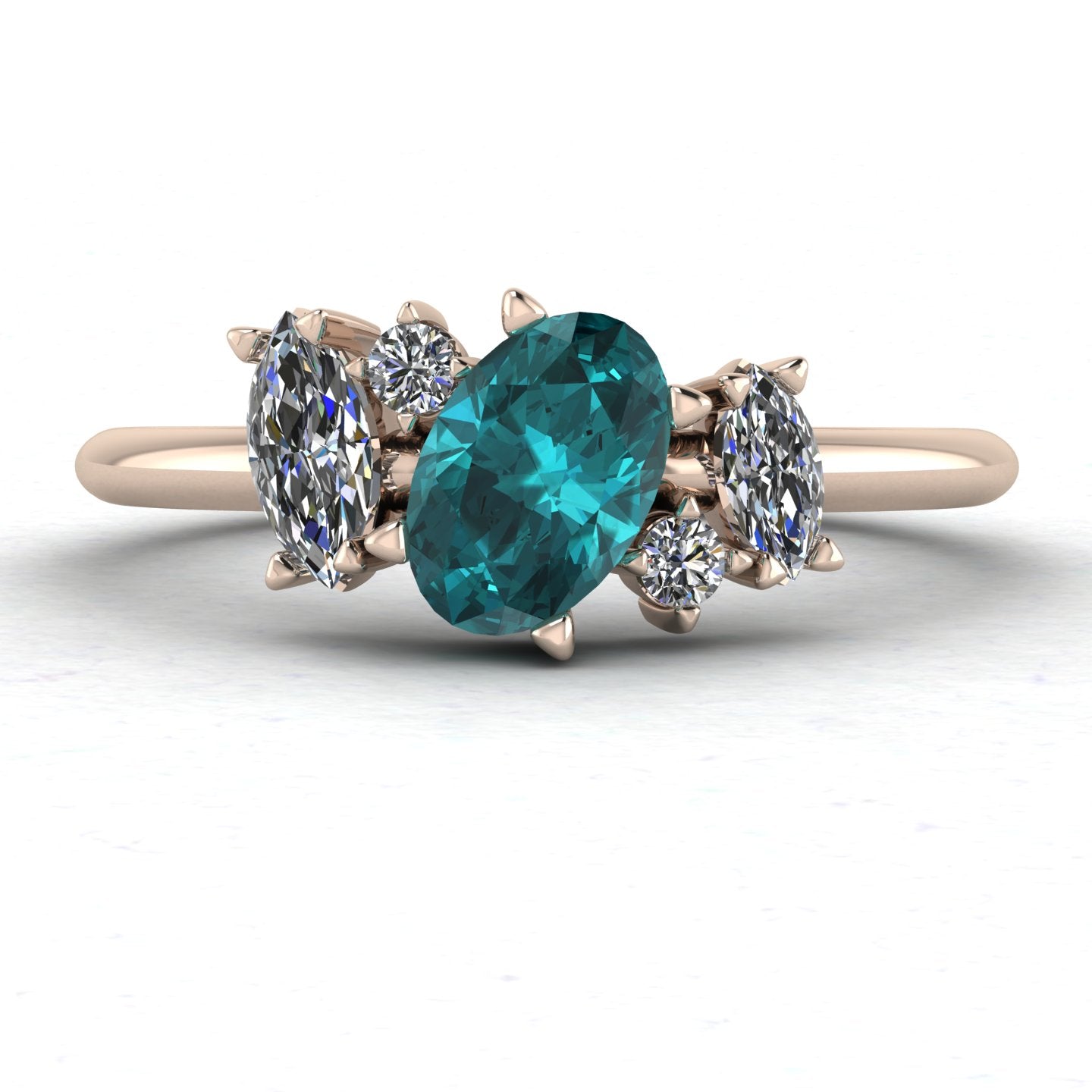 Front view of the Atlantis engagement ring, featuring an organic, asymmetrical cluster of ocean-toned teal sapphires and sparkling white diamonds in 18ct rose gold.