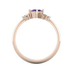 A view looking through the band, detailing the thickness of the 18ct rose gold and the varying heights of the violet sapphire and diamond cluster.