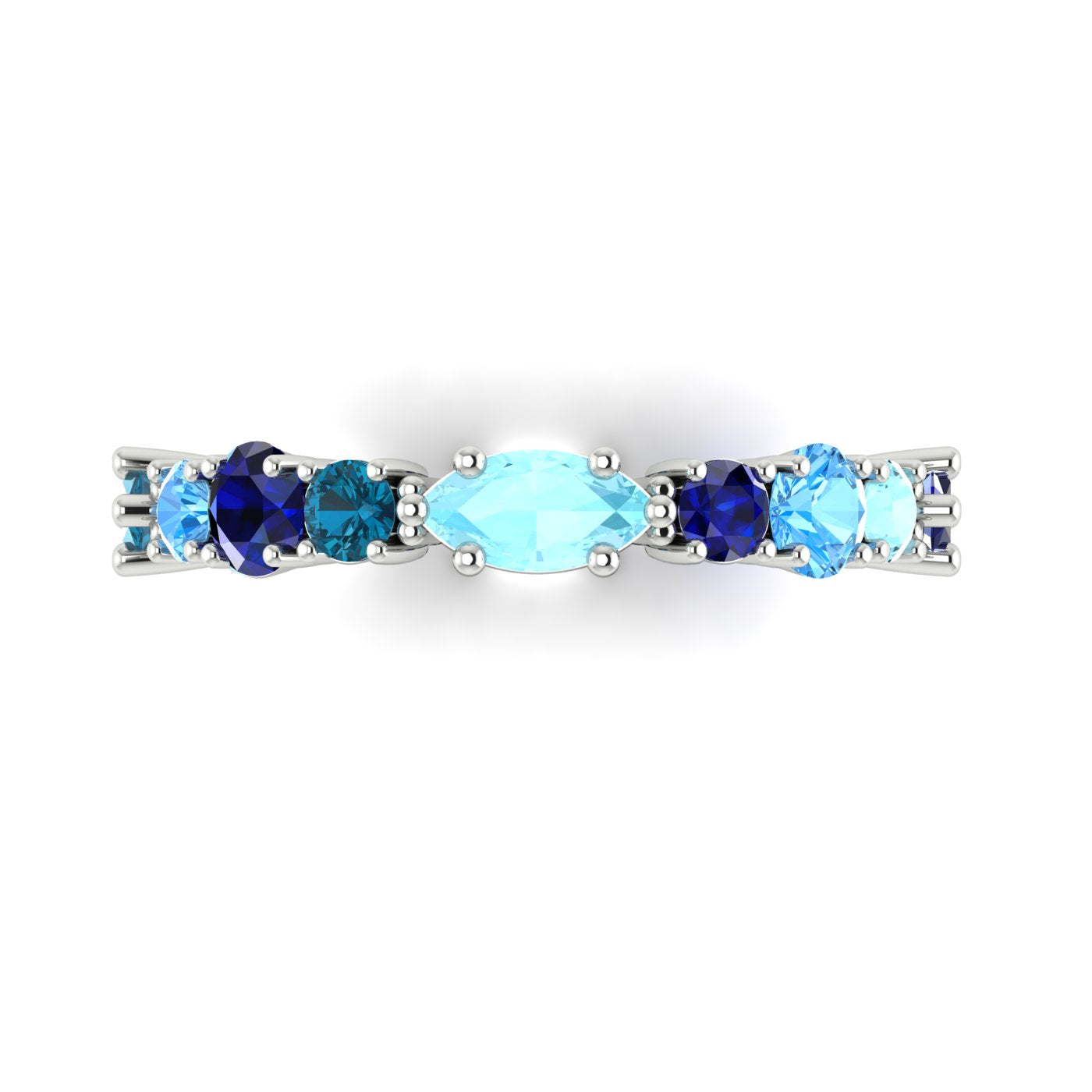 Modern blue sapphire eternity ring styled as a unique wedding band or anniversary gift, handcrafted in our Surrey studio.