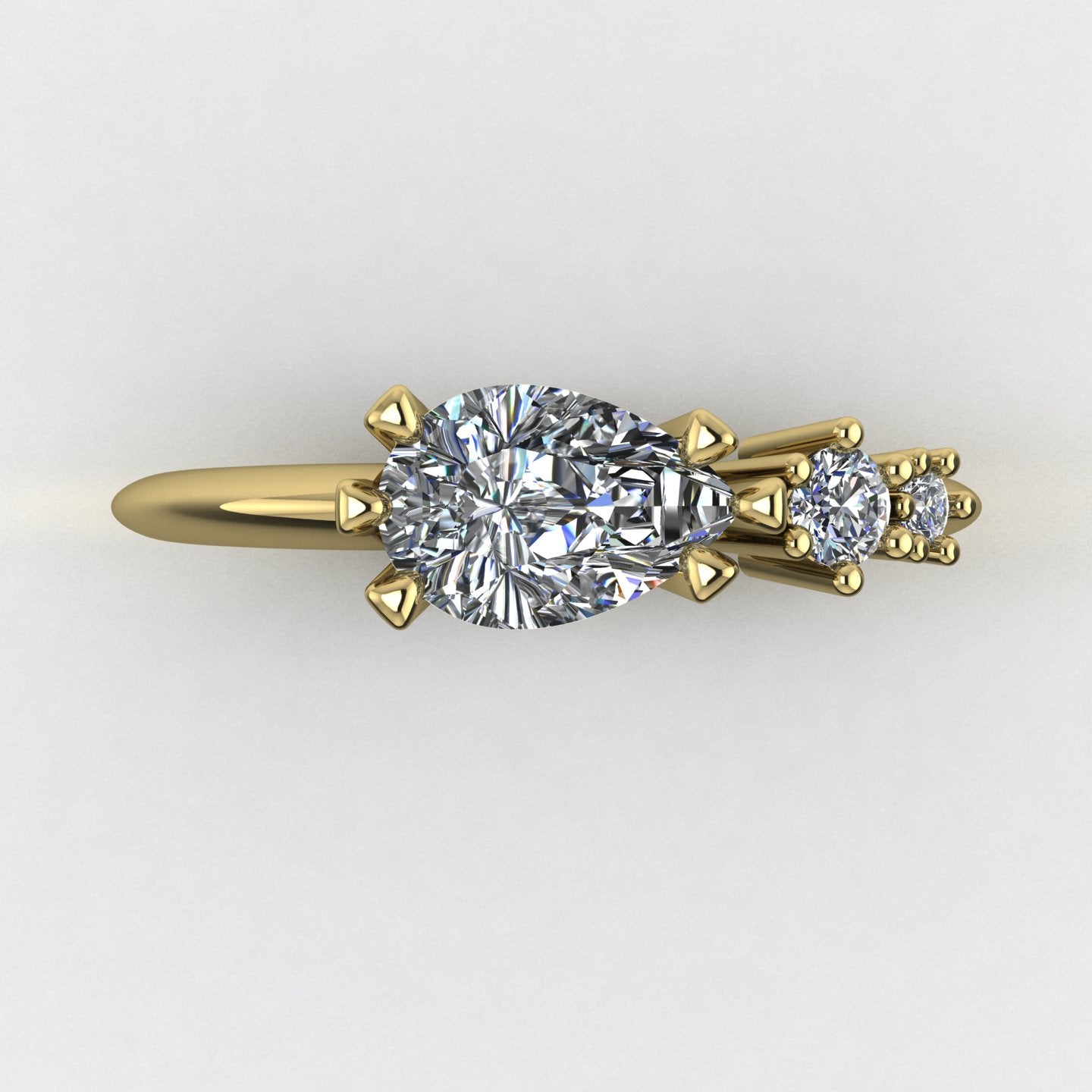 Comet Ring: Pear Shaped Lab Grown Diamonds Asymmetrical Gold Trilogy Ring