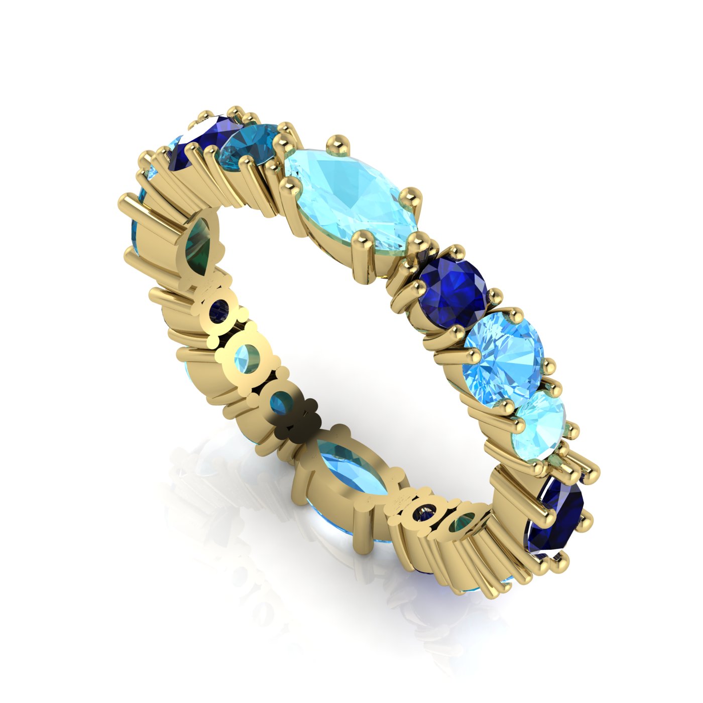 18ct yellow gold eternity ring featuring a gradient of blue gemstones including marquise-cut sapphires, aquamarines, and round blue topaz.