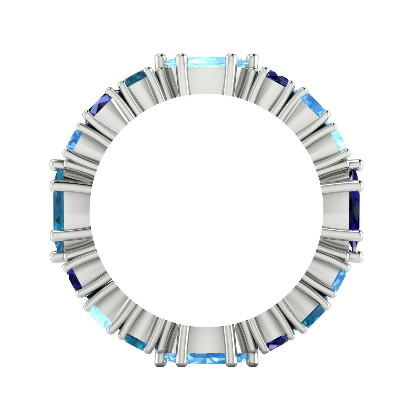 Close-up of an artisan sapphire and aquamarine ring, showcasing the independent British jewellery craftsmanship and recycled gold.