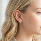Scale view of 11mm sterling silver Vanilla studs demonstrating their size for everyday jewellery wear.