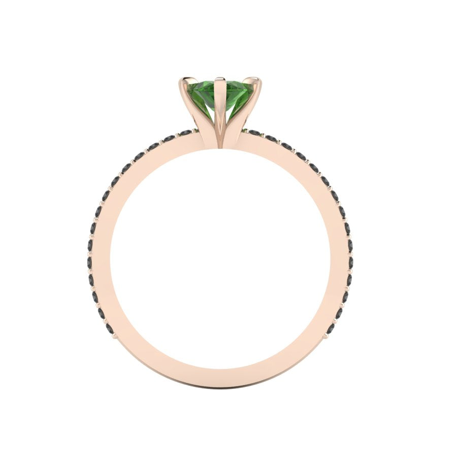 A through-finger view of the Amoret tourmaline ring showing the internal rose gold band and clean setting symmetry.