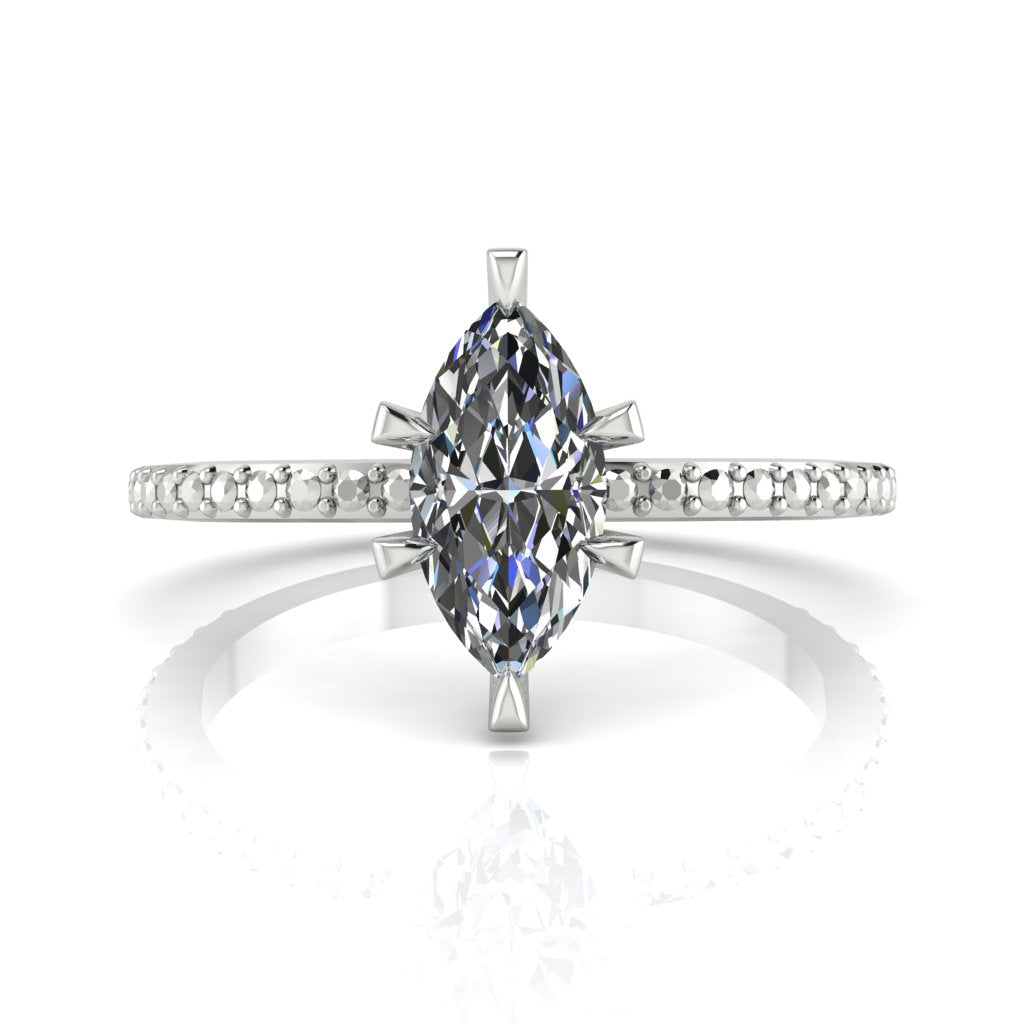 Profile view of the Amoret marquise diamond solitaire ring showing the elegant, low-profile claw setting and the slender handcrafted band.