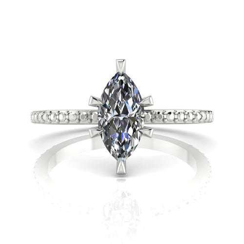 Profile view of the Amoret marquise diamond solitaire ring showing the elegant, low-profile claw setting and the slender handcrafted band.