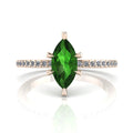 Front profile view of the Amoret green tourmaline ring in 18ct rose gold showing the elegant marquise silhouette and grain-set diamond shoulders.