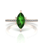 Front profile view of the Amoret green tourmaline ring in 18ct rose gold showing the elegant marquise silhouette and grain-set diamond shoulders.