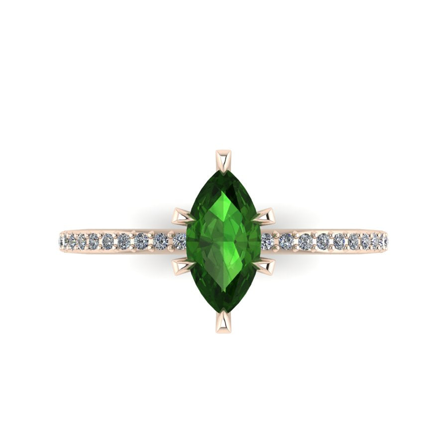 Top-down view of the Amoret ring showing the symmetrical marquise green tourmaline and the sparkle of the white diamond shoulders.