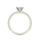 A through-finger view of the Amoret lab-grown diamond ring showing the internal band and the clean, architectural setting symmetry.
