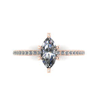 Top-down view of the Amoret engagement ring showing the symmetrical marquise lab diamond and the diamond-set rose gold band.