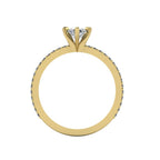 A through-finger view of the Amoret lab-grown diamond ring showing the internal yellow gold band and the clean setting symmetry.