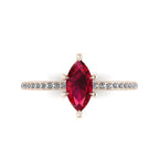 Top-down view of the Amoret ring showing the symmetrical marquise ruby and the sparkle of the brilliant-cut diamond shoulders.