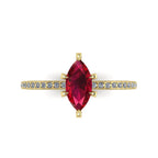 Top-down view of the Amoret ring showing the symmetrical marquise ruby and the sparkle of the brilliant-cut diamond shoulders.