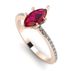 Angled profile view of the Amoret ruby ring in 18ct rose gold showing the elegant marquise silhouette and low-set diamond shoulders.