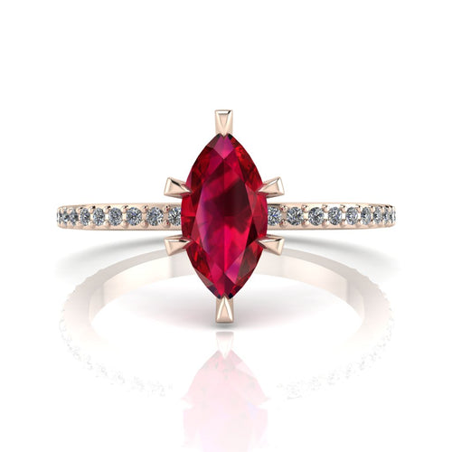 Profile view of the Amoret ruby ring in 18ct rose gold showing the elegant marquise silhouette and low-set diamond shoulders.