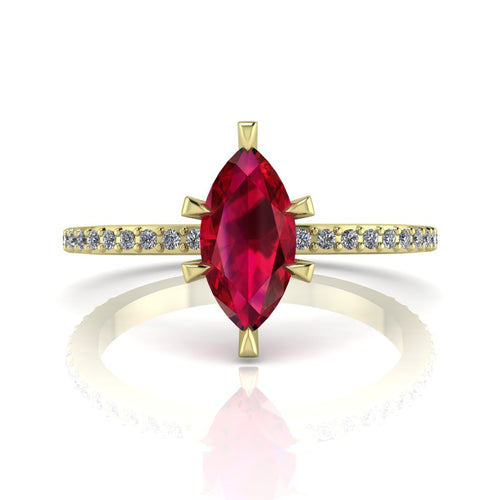 Profile view of the Amoret ruby ring in 18ct yellow gold showing the elegant marquise silhouette and grain-set diamond shoulders.