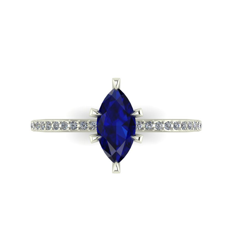 Top-down view of the Amoret ring showing the symmetrical marquise sapphire and the sparkle of the brilliant-cut diamond shoulders against white gold or platinum.