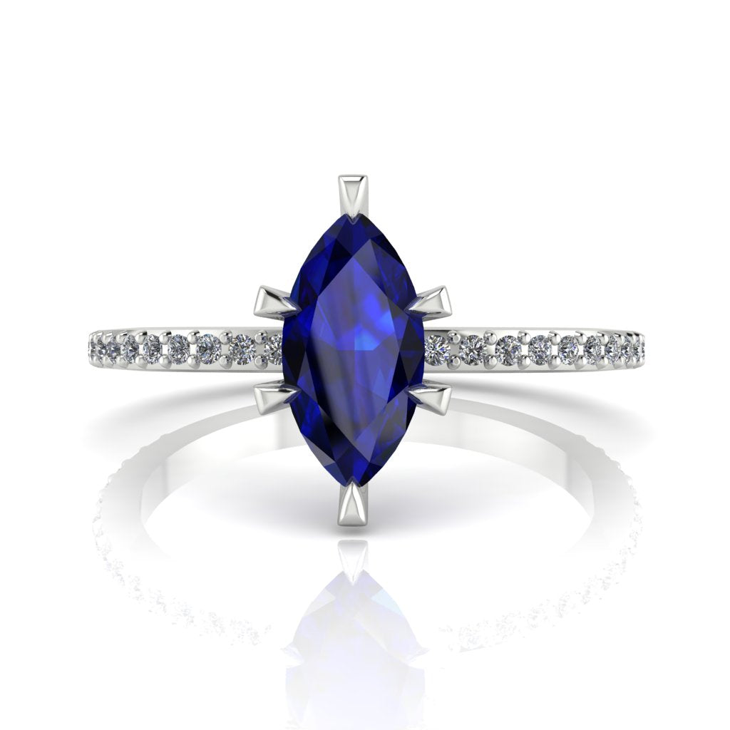 Profile view of the Amoret sapphire ring in 18ct white gold or platinum showing the elegant marquise silhouette and grain-set diamond shoulders.