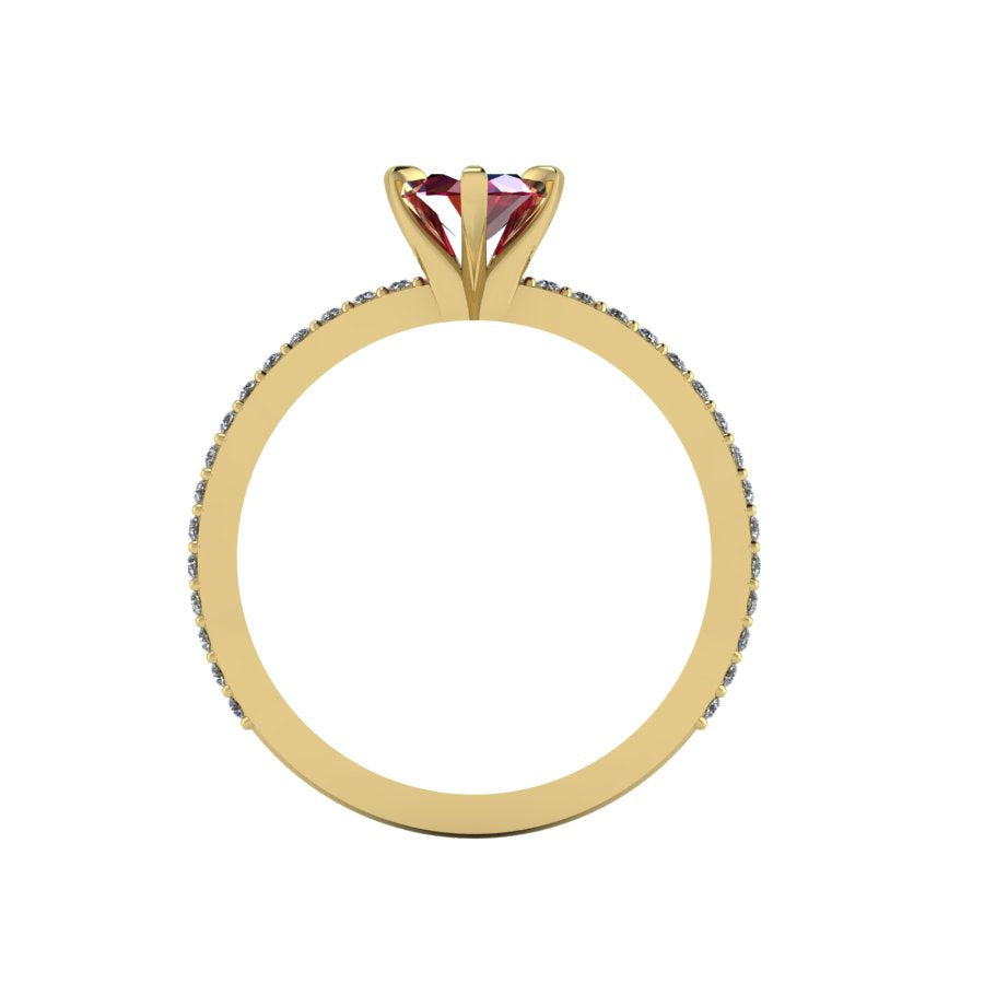 A through-finger view of the Amoret ruby ring showing the internal yellow gold band and clean setting symmetry.