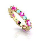 Fire & Ice eternity ring with aquamarine and pink sapphire in 18ct yellow gold.