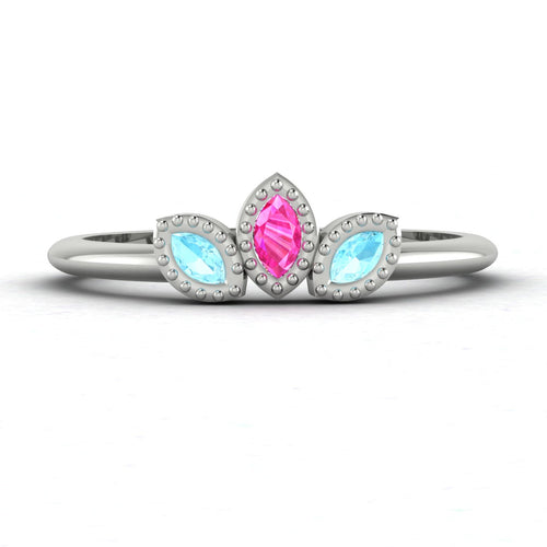 Front view of the Astraea Echo trilogy ring featuring an aquamarine centre and pink sapphire marquise shoulders in white gold.