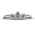 Front view of the Astraea Echo trilogy ring featuring a brilliant-cut diamond centre and marquise diamond shoulders in white gold or platinum.