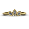 Front view of the Astraea Echo trilogy ring featuring a brilliant-cut diamond centre and marquise diamond shoulders in 18ct yellow gold.
