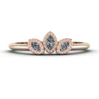 Front view of the Astraea Echo trilogy ring featuring a fanned trio of marquise diamonds in 18ct rose gold.