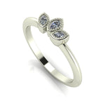 Side profile view of the Astraea Echo diamond ring showing the architectural white gold setting and the depth of the gemstones.