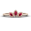 Front view of the Astraea Echo trilogy ring featuring a ruby centre and ruby marquise shoulders in 18ct rose gold.