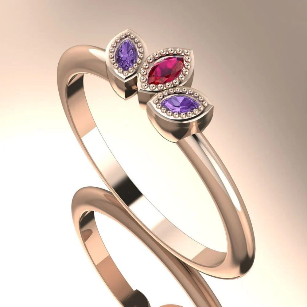 Side profile view of the Astraea Echo ring showing the architectural rose gold setting and the depth of the violet sapphire and rubies.